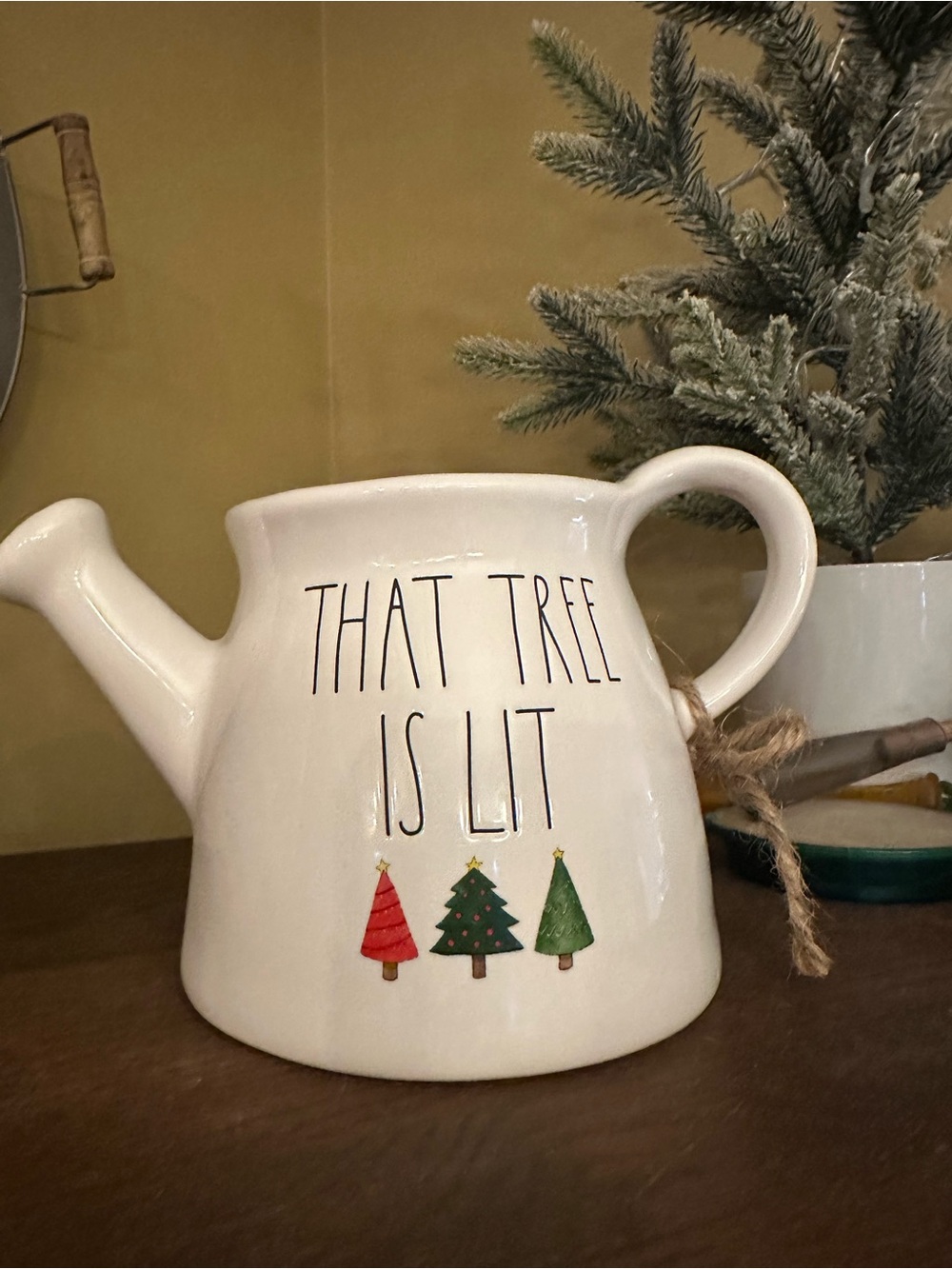 Rae Dunn Cream Ceramic Watering Can 'That Tree Is Lit' with Red and Green Trees